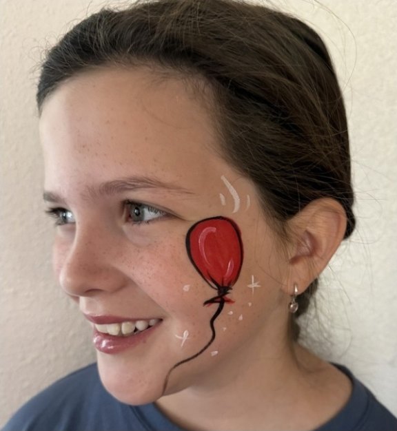 Balloon face painting design for winter and holiday events by About Face Painting, Denver