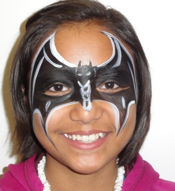 Batman face painting design for summer events by About Face Painting, Denver
