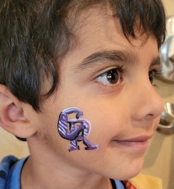 CO Rockies face painting design for summer events by About Face Painting, Denver