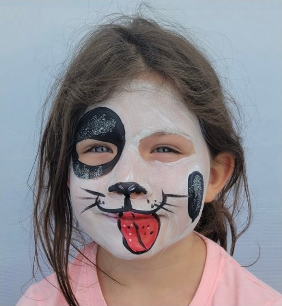 Dog face painting design for summer events by About Face Painting, Denver