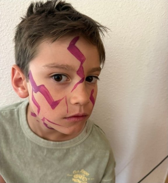 K-Pop face painting design for winter and holiday events by About Face Painting, Denver