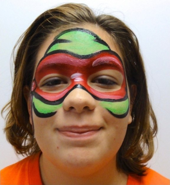 Ninja Turtle face painting design for summer events by About Face Painting, Denver