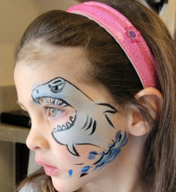 Shark face painting design for summer events by About Face Painting, Denver