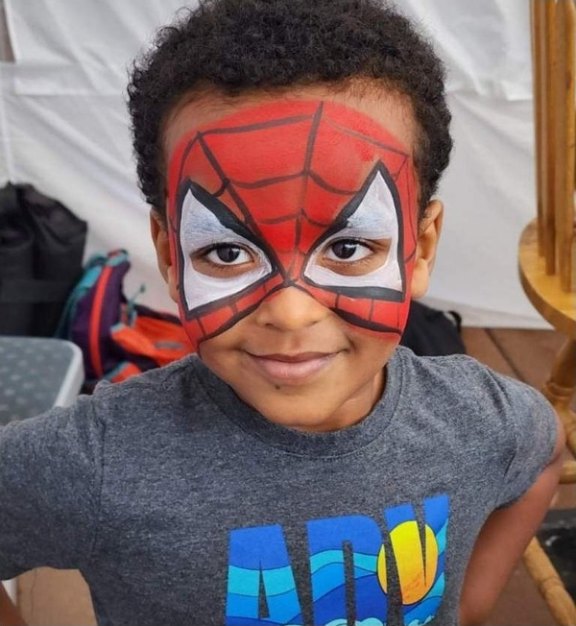 Spiderman face painting design for summer events by About Face Painting, Denver
