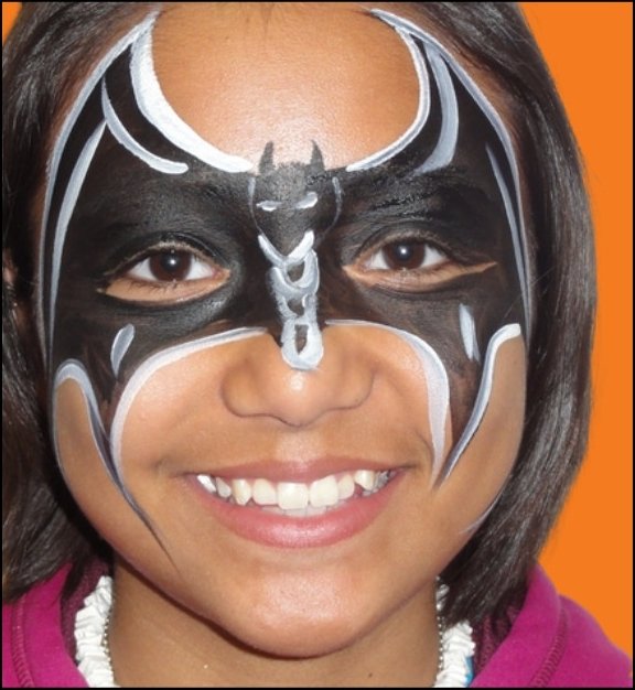 Batman Halloween face painting design by About Face Painting, Denver