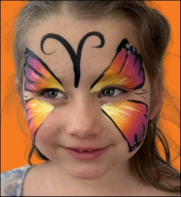 Butterfly Halloween face painting design by About Face Painting, Denver