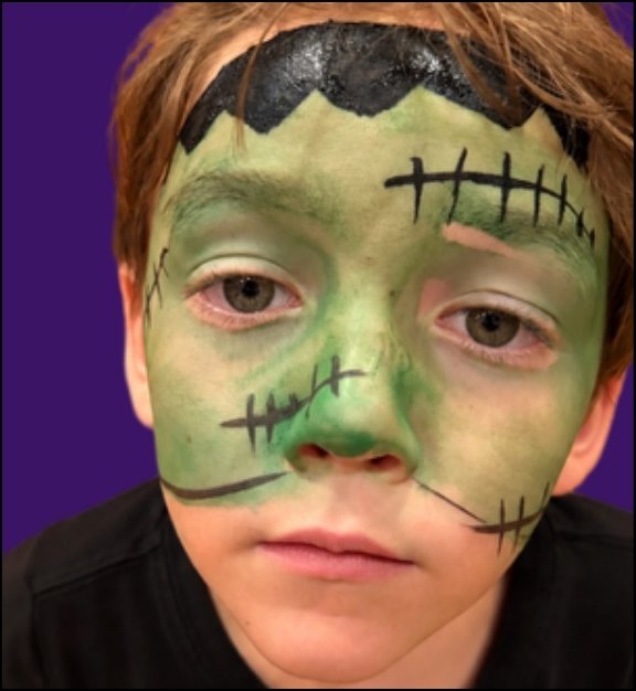 Frankenstein Halloween face painting design by About Face Painting, Denver
