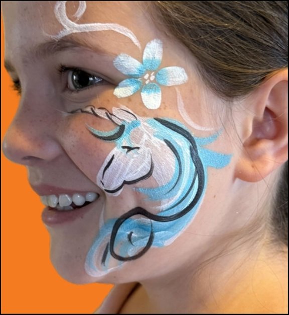 Unicorn Halloween face painting design by About Face Painting, Denver