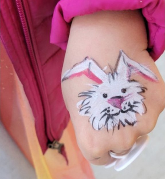 Bunny face painting design for Easter and spring events by About Face Painting, Denver