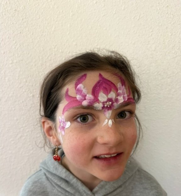 Flower Princess face painting design for Easter and spring events by About Face Painting, Denver